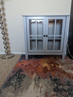 Small cabinet with glass doors