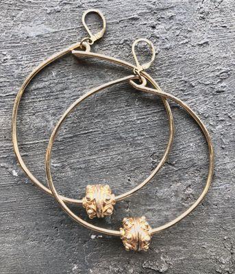 Brass hoop earrings with gold detail