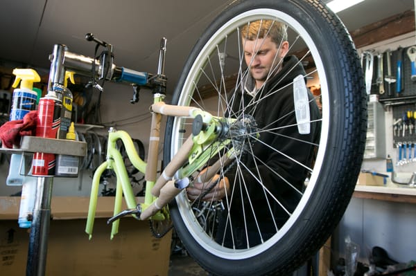 Owner Charlie assembling a new bike.