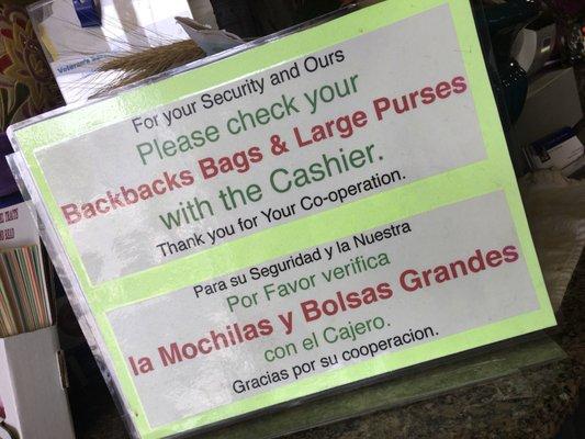 You have to leave your backpacks and large purses at the cashier.