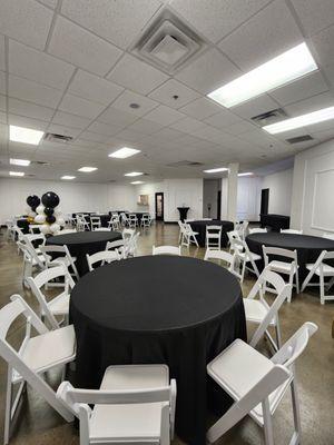 Rental includes round tables, linens and white garden chairs with seating up to 120 guests.