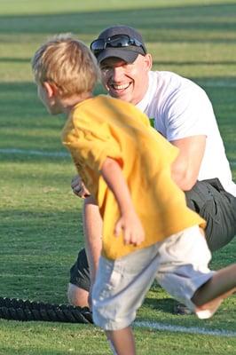 Amped Fitness volunteered their time to work with kids at Mentor Day Program held at the UofA.