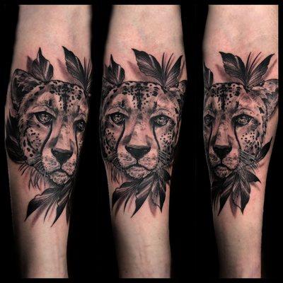 Cheetah portrait realism tattoo