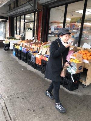 Store front display of fruit and vegetables