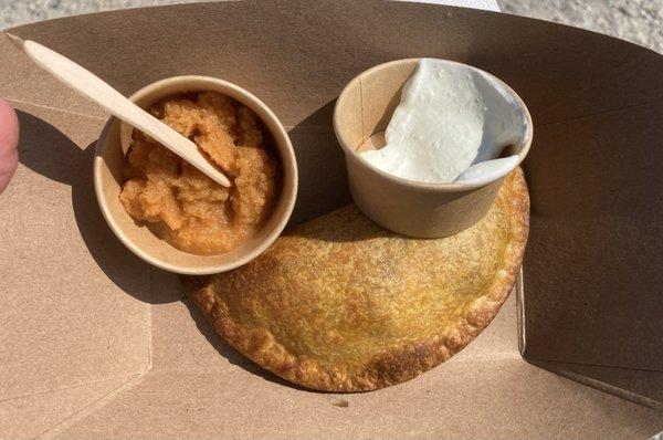 Chicken empanada with carrot salsa