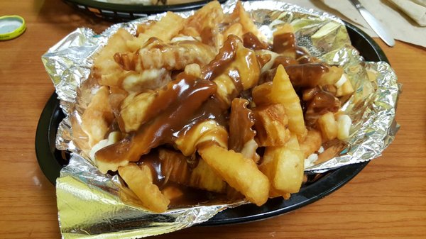 The poutine was very, very good.  The gravy was great and the fries were crunchy.  The cheese curd made it great!