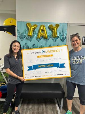 Lauren Celebrates with her patient with a Graduation Photo