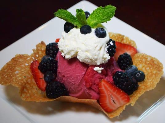 Blood Orange Sorbet in a Caramel Cookie Nest with Honey Whipped Cream and Fresh Berries