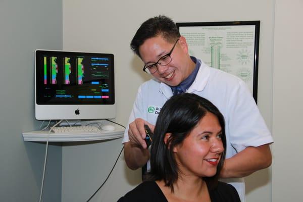 Computer spinal analysis and gentle chiropractic adjustments also called multiple impulse therapy.