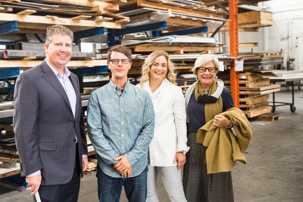 TMC visiting client, Chris French Metal, in his West Oakland warehouse that was purchased with a 504 loan from TMC Financing.