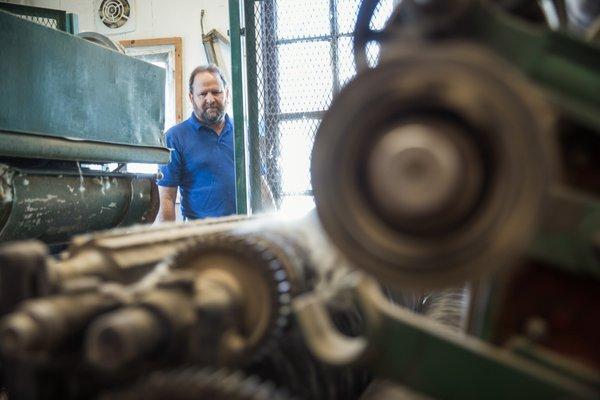 Overlooking one of our historic machines that still process wool into cozy wool filled bedding