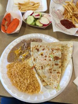 Cheese quesadilla special with rice and beans. I added tomatoes and lettuce.