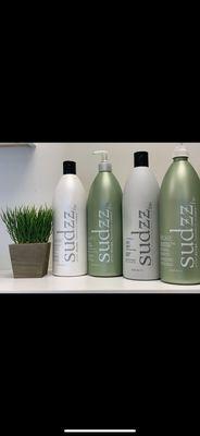 We use sudzz at the shampoo bowls!