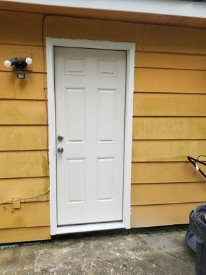 After removing old rotted, leaking door with a new fiberglass door.