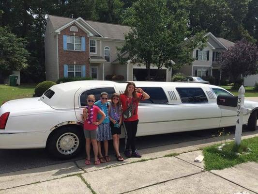 Getting ready to take off in a beautiful white stretch limo.