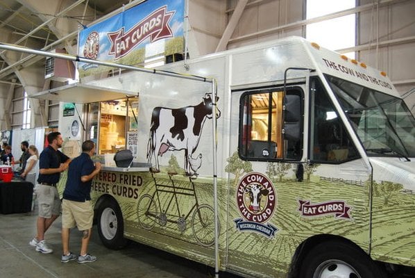 The Cow and The Curd food truck parked inside