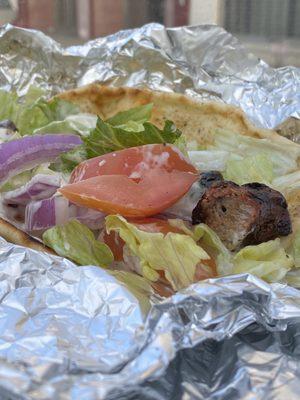 Dashboard Lamb Gyro On pita bread w/ lettuce tomato onions and your choice of sauce Tzatziki,mayo,bbq or hot sauce -@fork.the.world