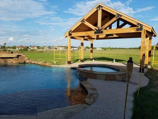 An outdoor patio made with our custom designed timber trusses