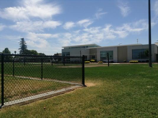 The volleyball net on the side of the community center.