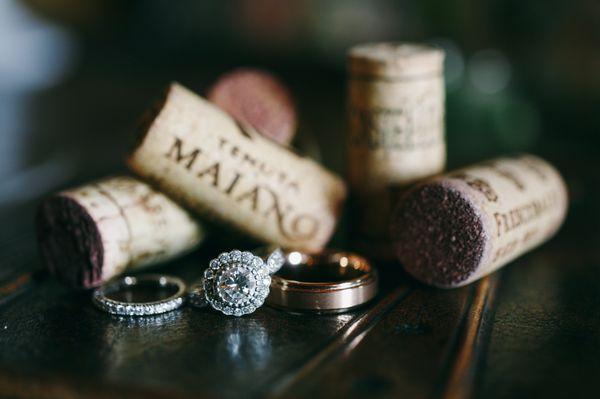 T&H wedding band pictured on far left. Diamonds are 3/4 around the band.