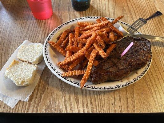 KC strip steak dinner with sweet potato fries and a roll (side salad also included)