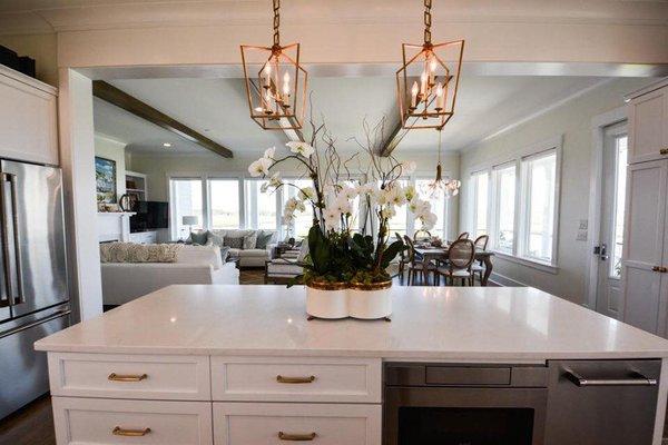 White Quartz countertops with Gold accents.