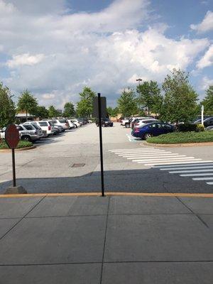 Yep there's parking for the shopping center, but not private parking.