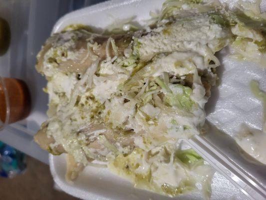 The tamale/clothing/jewelry stand next to taco truck    preparado: wasn't dry but not the most flavor even with everything on it