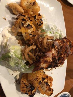 Buffalo cauliflower wedge salad with blackened chicken breast