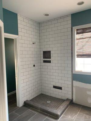 full view of shower with 2 inch gap to the right side.