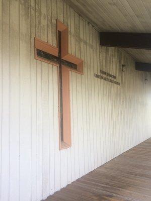 Their glass cross that is on the sanctuary wall