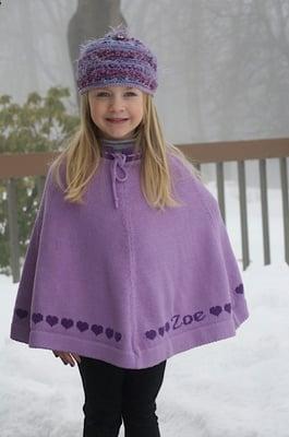 Zoe's personalized heart poncho.