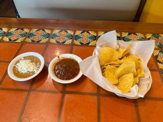 Complementary chip and salsa and beans