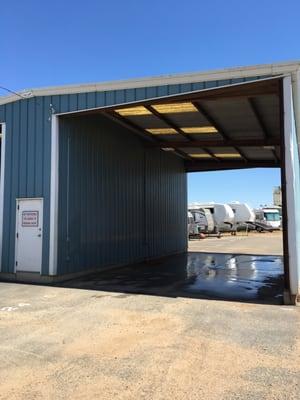 Self-wash bay for storage customers