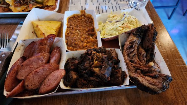 Kielbasa, burnt ends, brisket, corn bread, baked beans, cole slaw