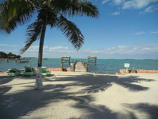 Private beach and dock at Stoneledge Paradise Inn in the Keys