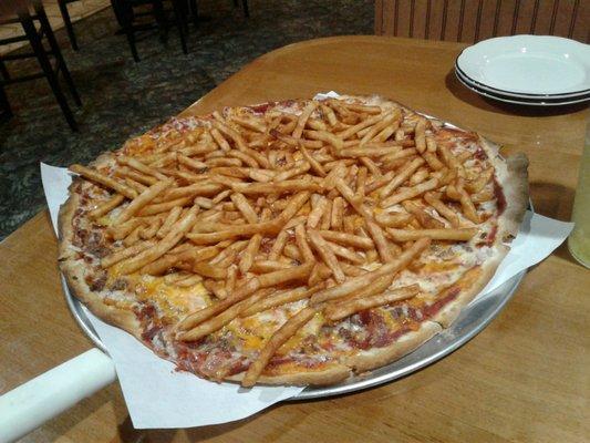 Cheeseburger and fries pizza.