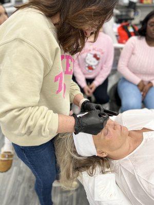 Teaching Dermaplane to an eager group of future estheticians