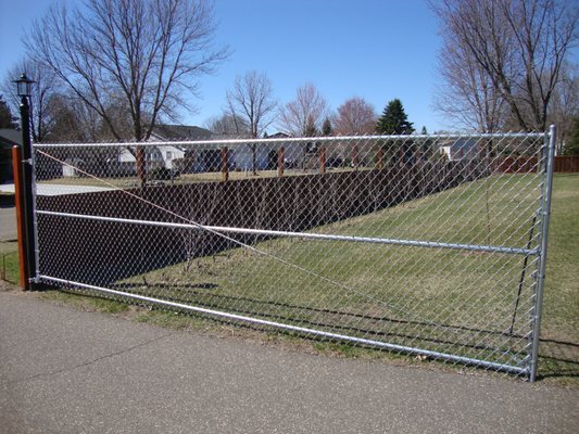 Custom 19 1/2 foot gate installed last fall...adding an electric opener & lock this summer.  These guys are the BEST!!!