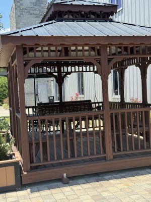 Outdoor gazebo with swing