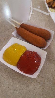 Perfectly fried corn dogs with mustard and ketchup 2x $5.55