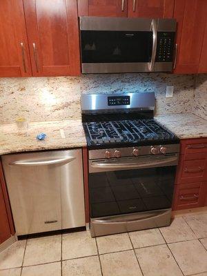 Newly installed Frigidaire over the range microwave and stove