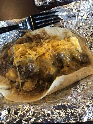 Carne guisada, egg & cheese breakfast taco. Yum!