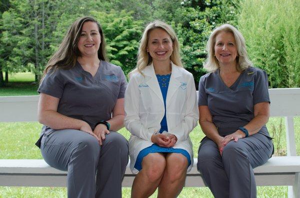 Dr. Caroline with her amazing staff, Teal and Pat.