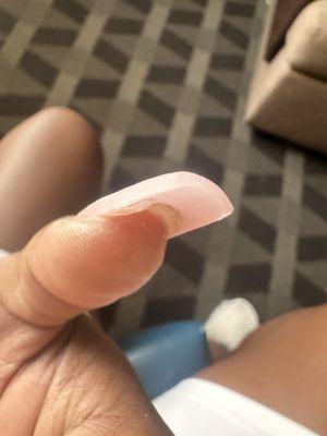 My nail isn't even glued to the attached tip