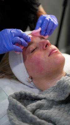 This is a client who is getting a facial service done. Our talented estheticians will take care of your skincare needs!