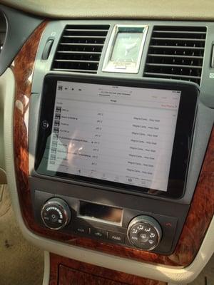 Newer Cadillac DTS ipad mini custom fiberglased into dash.