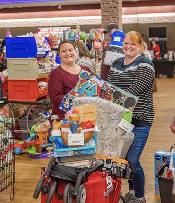 Happy shoppers LOVE all the bargains at Bella Kids!