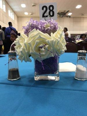 Fresh flowers on each of the tables.