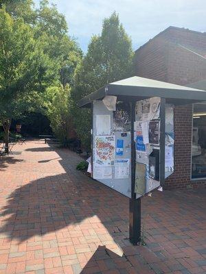 Bulletin board of local events in front